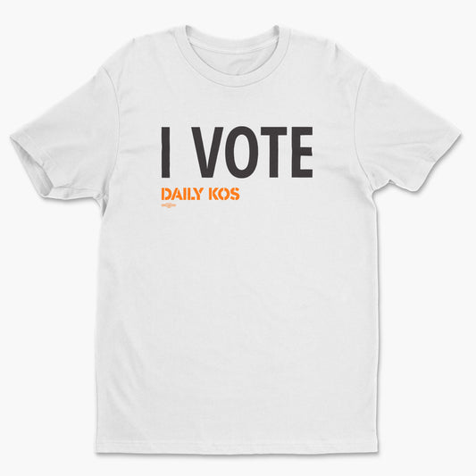White crew-neck T-shirt printed with bold black “I VOTE” lettering and small orange “DAILY KOS” text.