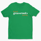 Green crewneck t-shirt with white and orange "Go touch grassroots daily kids" text across the chest.